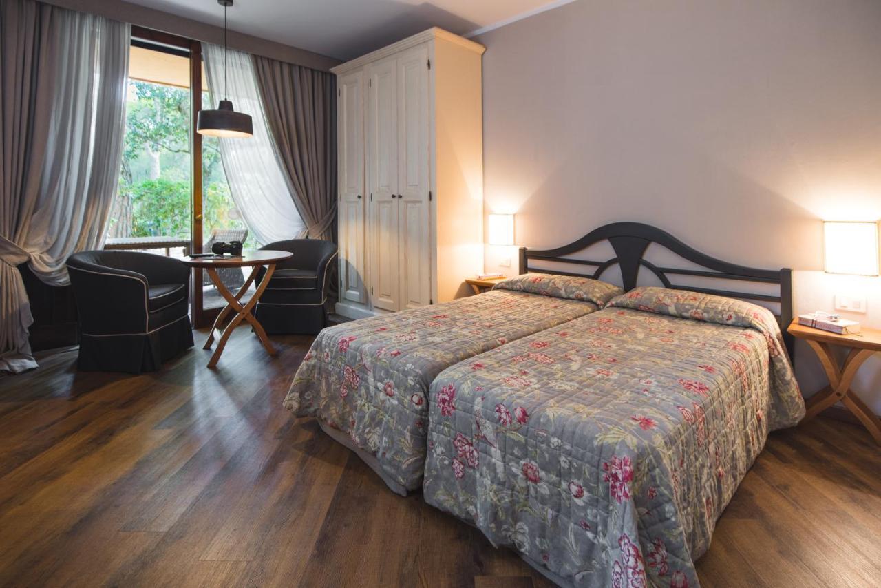 Roccamare Resort - Ville E Appartamenti Кастильоне-делла-Пеская Экстерьер фото